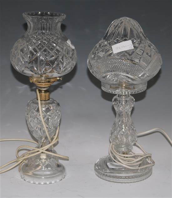 Two cut glass table lamps, largest 42cms